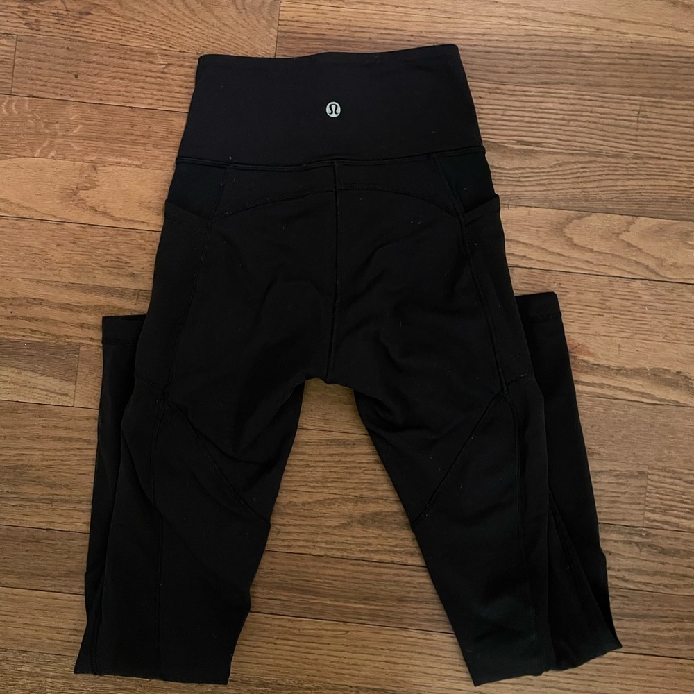 Lululemon black mesh side pocket leggings (old style)